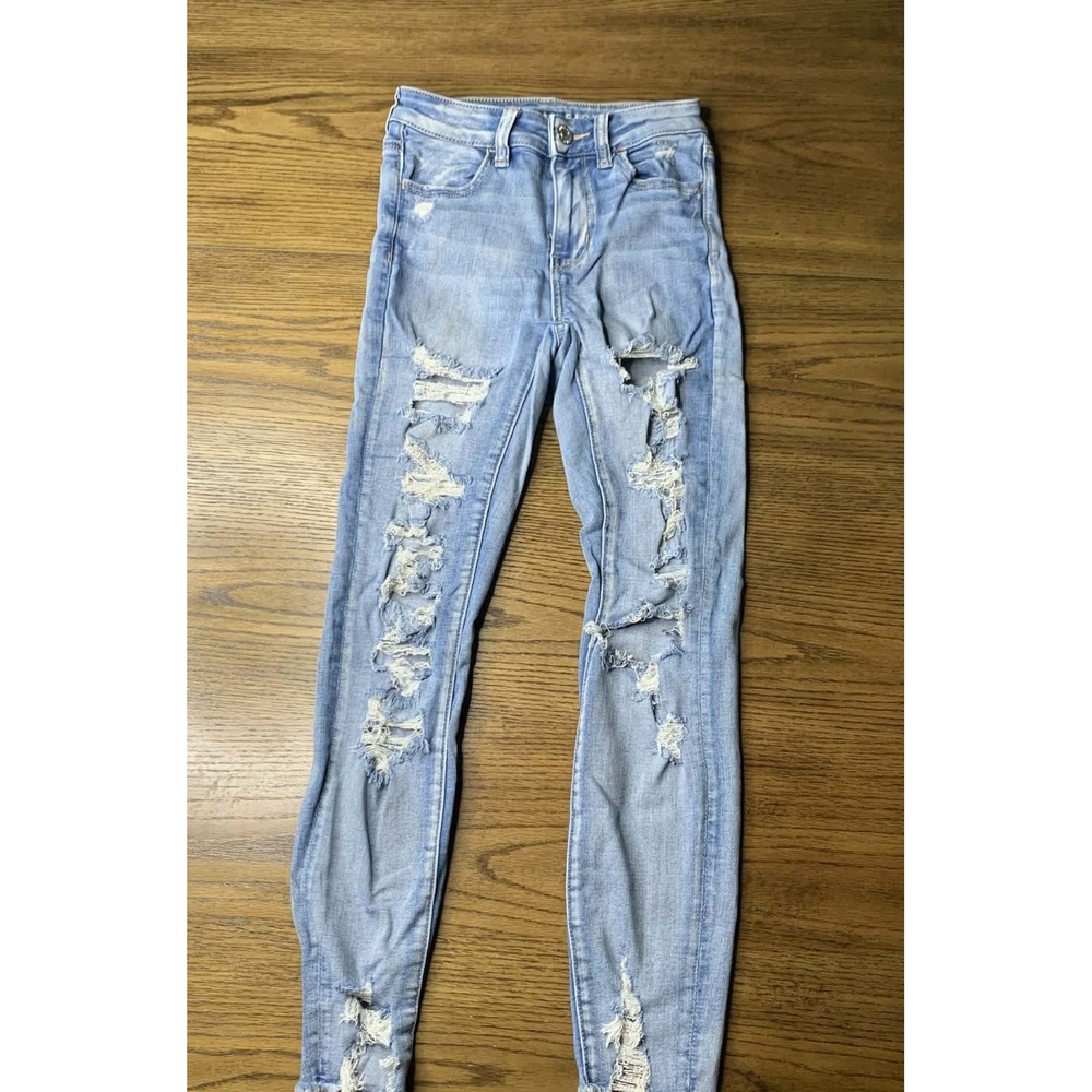 American Eagle Distressed Light Wash Super Stretch Skinny Jeans